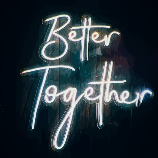 a neon sign that says better together